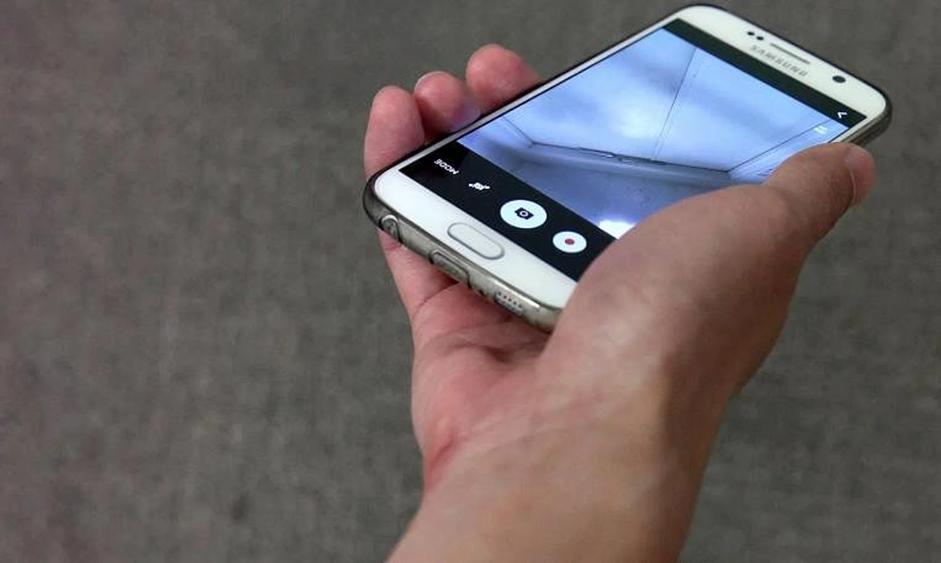 Muhammad Danial Nordin placed a mobile phone under a cubicle door with its camera pointing at a woman.