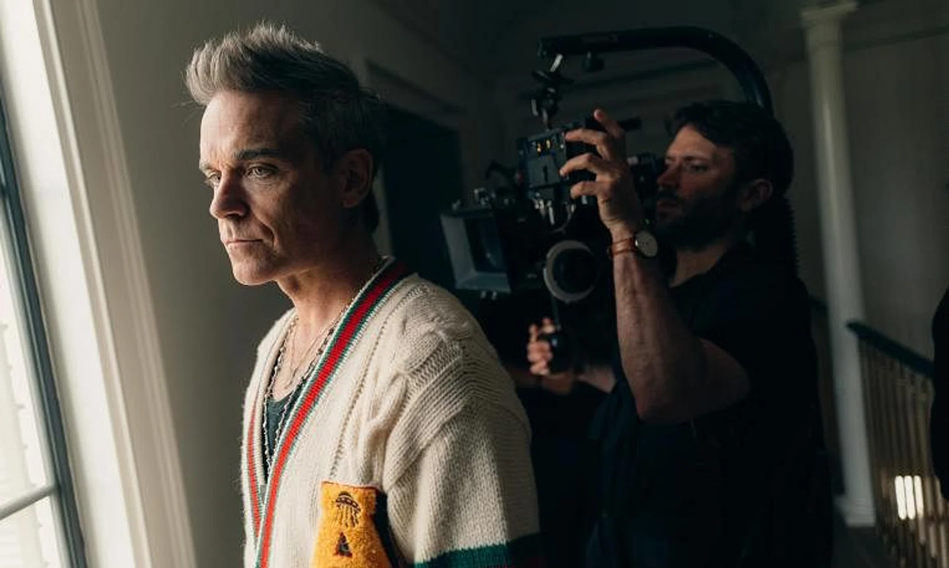 Robbie Williams' mental health is a running theme of the four-part series, which captures the intensity of his success.