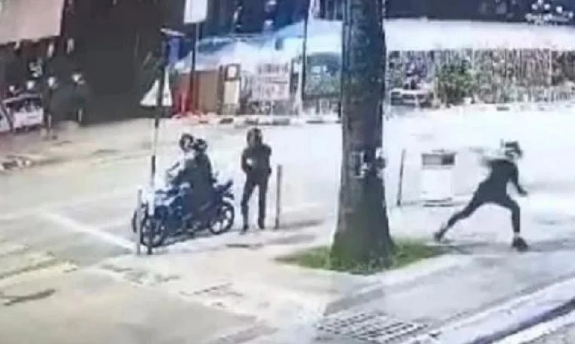 A molotov cocktail being thrown outside a nightclub near Jalan Yap Kwan Seng in Malaysia. 