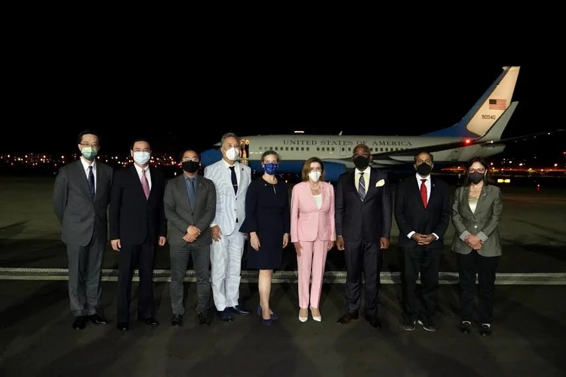 US House Speaker Nancy Pelosi (in pink) after arriving at Taipei's Songshan Airport on Aug 2, 2022.