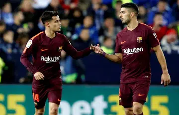 Suarez, Coutinho strike as Barca win