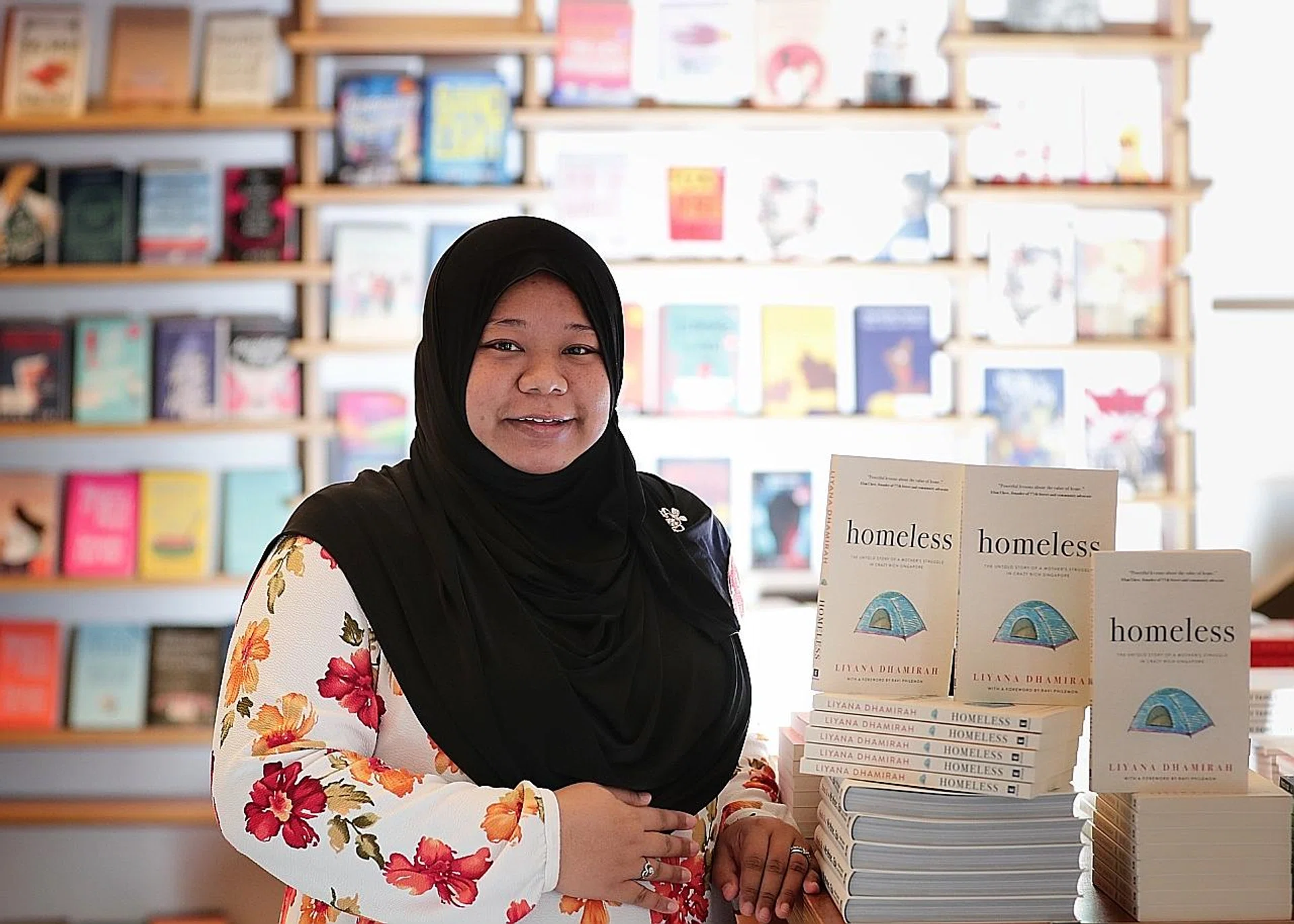 Ms Liyana Dhamirah's book is titled Homeless: The Untold Story Of A Mother's Struggle In Crazy Rich Singapore.