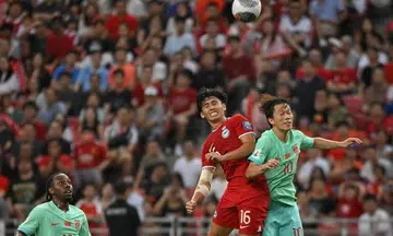 Singapore fight back to draw 2-2 with China