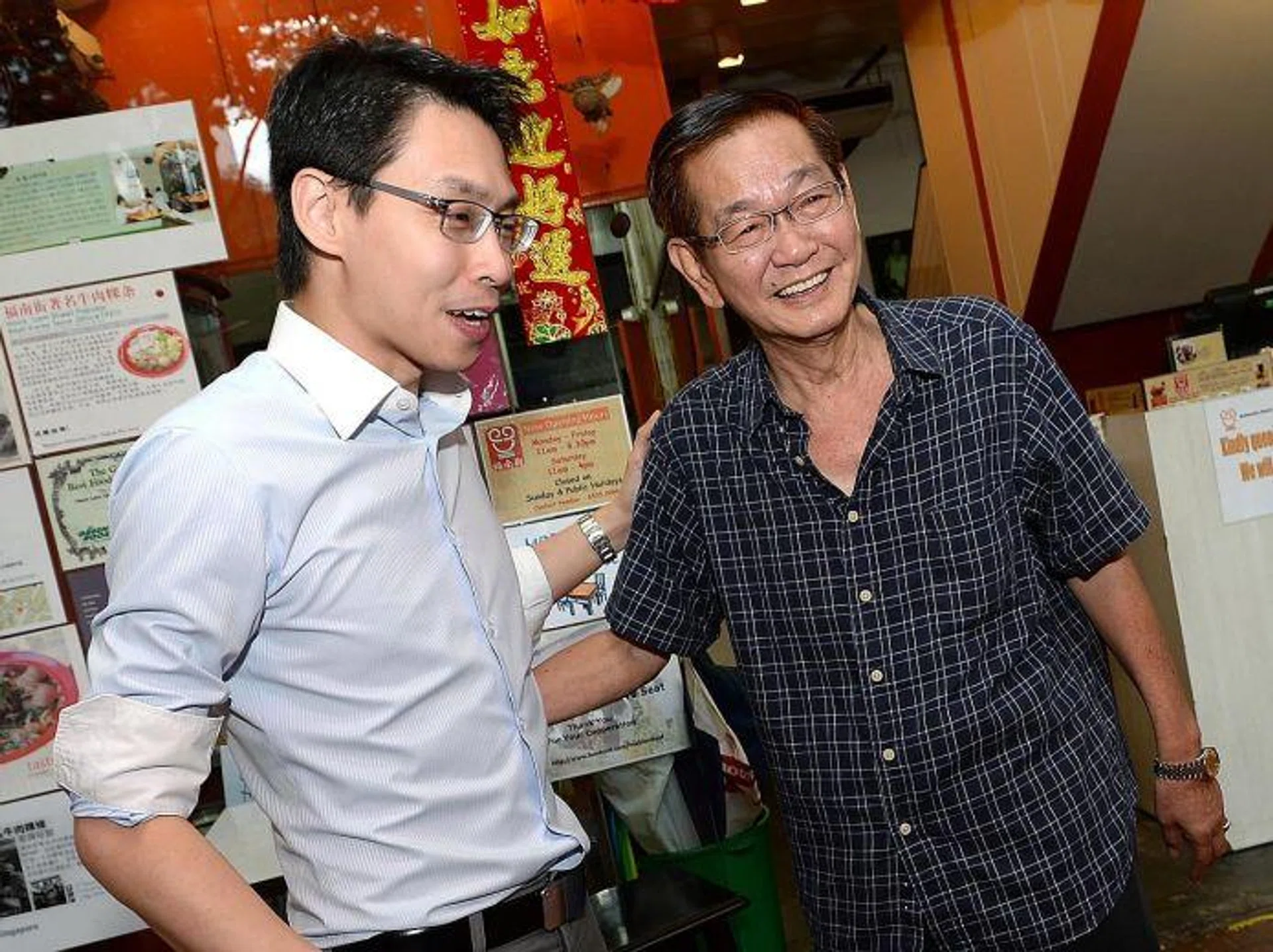 REUNION: Mr Tan Han Theng (right) met Mr Edwin Huang for the first time on Thursday since the incident.