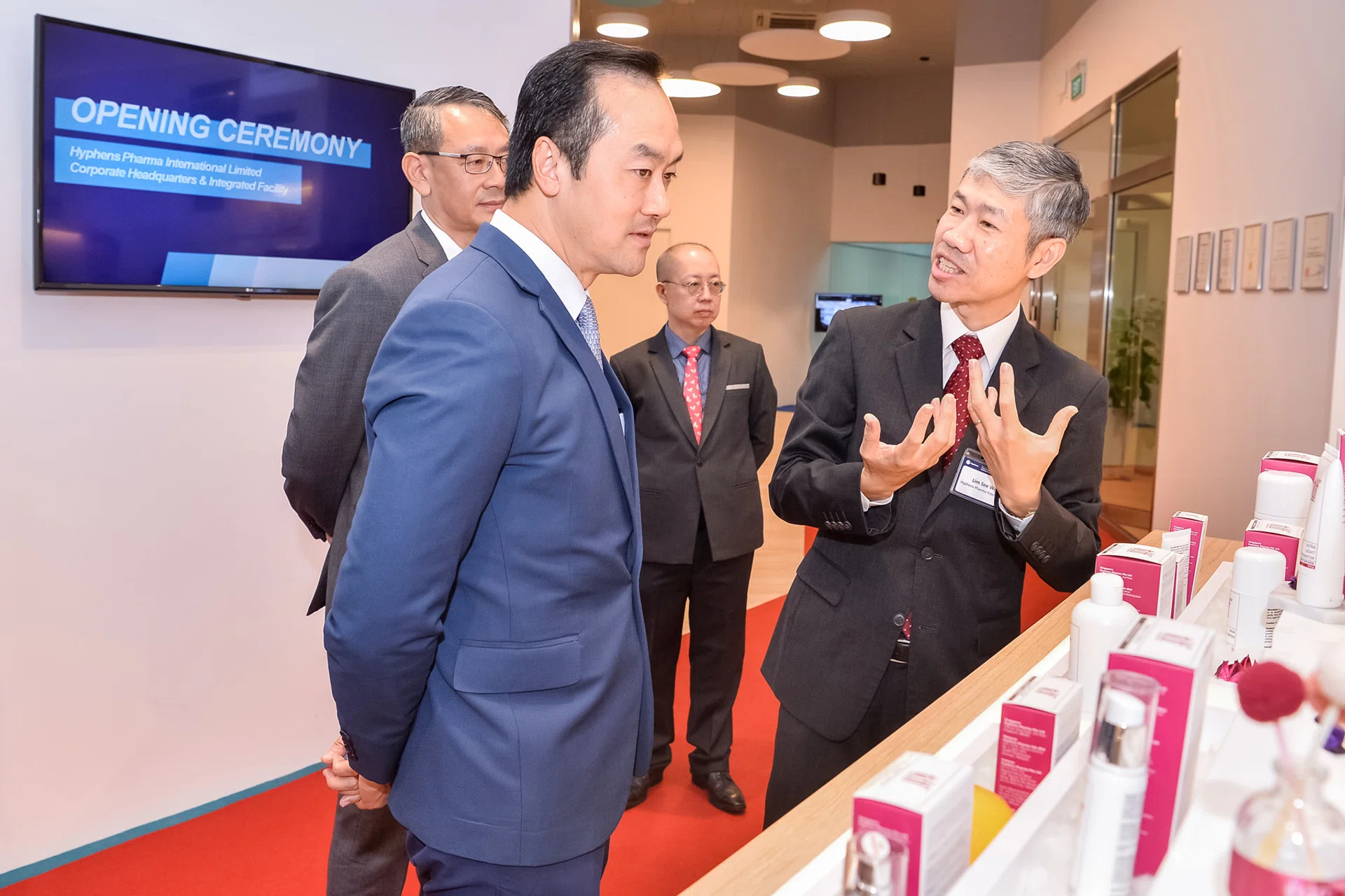 Mr Lim See Wah, chairman and CEO, Hyphens Pharma International (right), presenting a range of products to Dr Koh Poh Koon, Senior Minister of State, Ministry of Trade and Industry. 