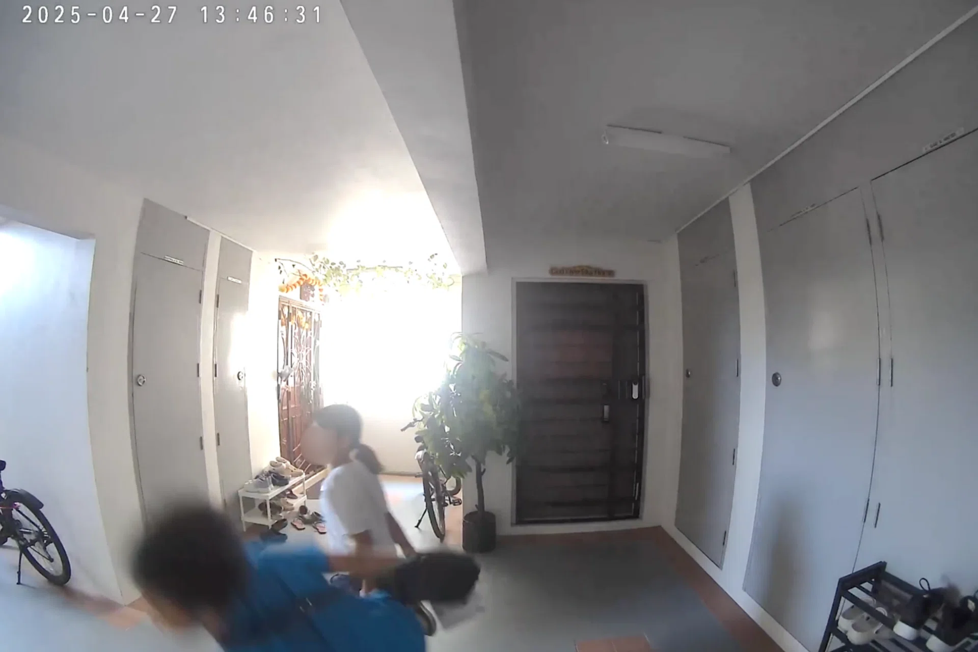 The video showed the boy jumping to kick the girl and losing his balance before a thud was heard.