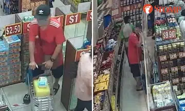 Man takes off with shopper's bag of paid items