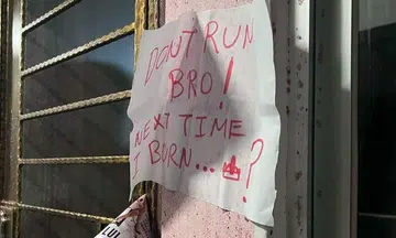 Man arrested for suspected loan shark harassment after vandalising flat with kerosene, paint