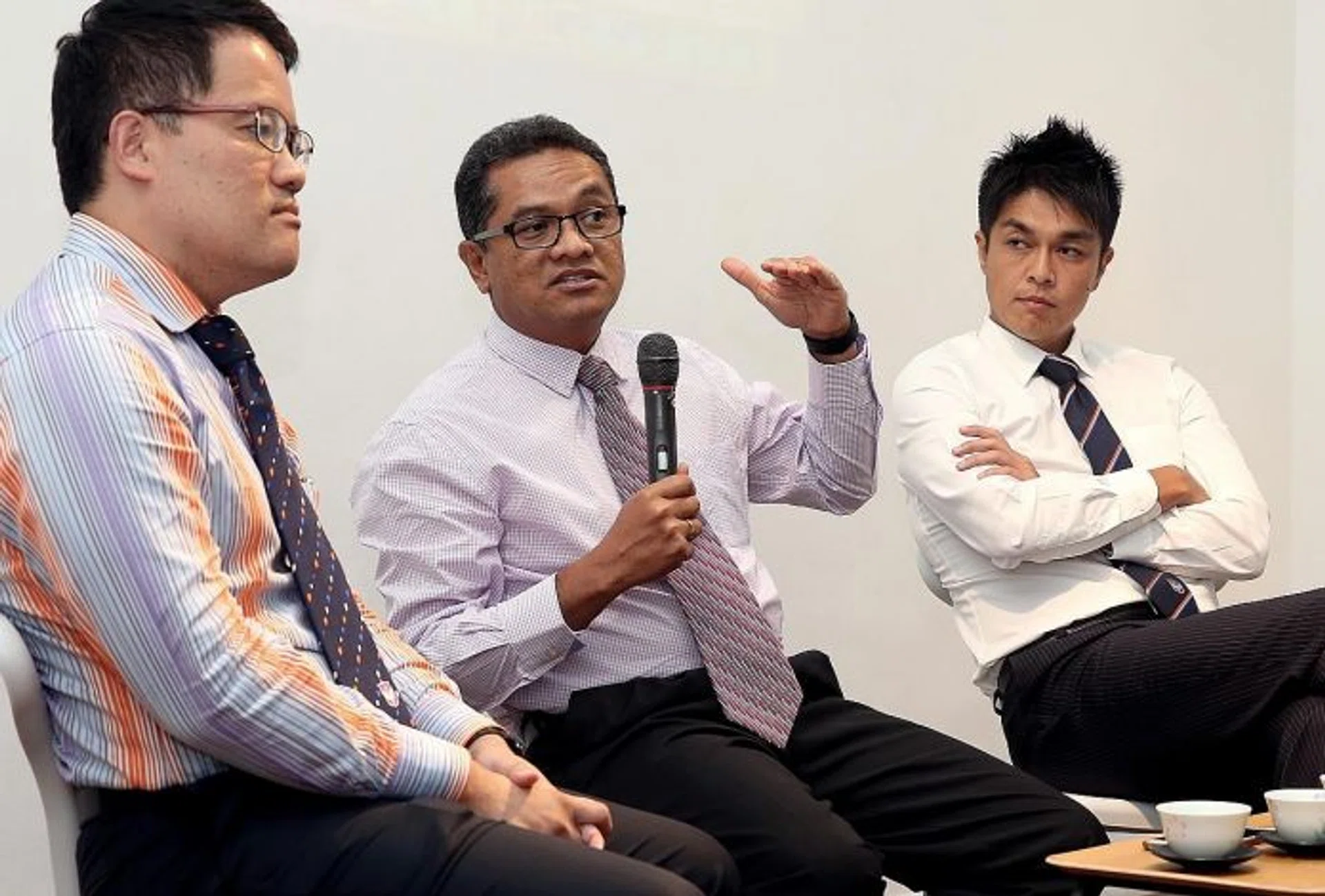 PLANNING AHEAD: FAS president Zainudin Nordin (second from left) also discussed the relationship between Singapore and Japanese football with Albirex Niigata (Singapore) chairman Daisuke Korenaga (near left) and their general manager Koh Mui Tee (far left).