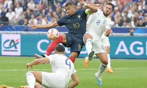Record Mbappe leads France to another Euro qualifier win against 10-man Greece