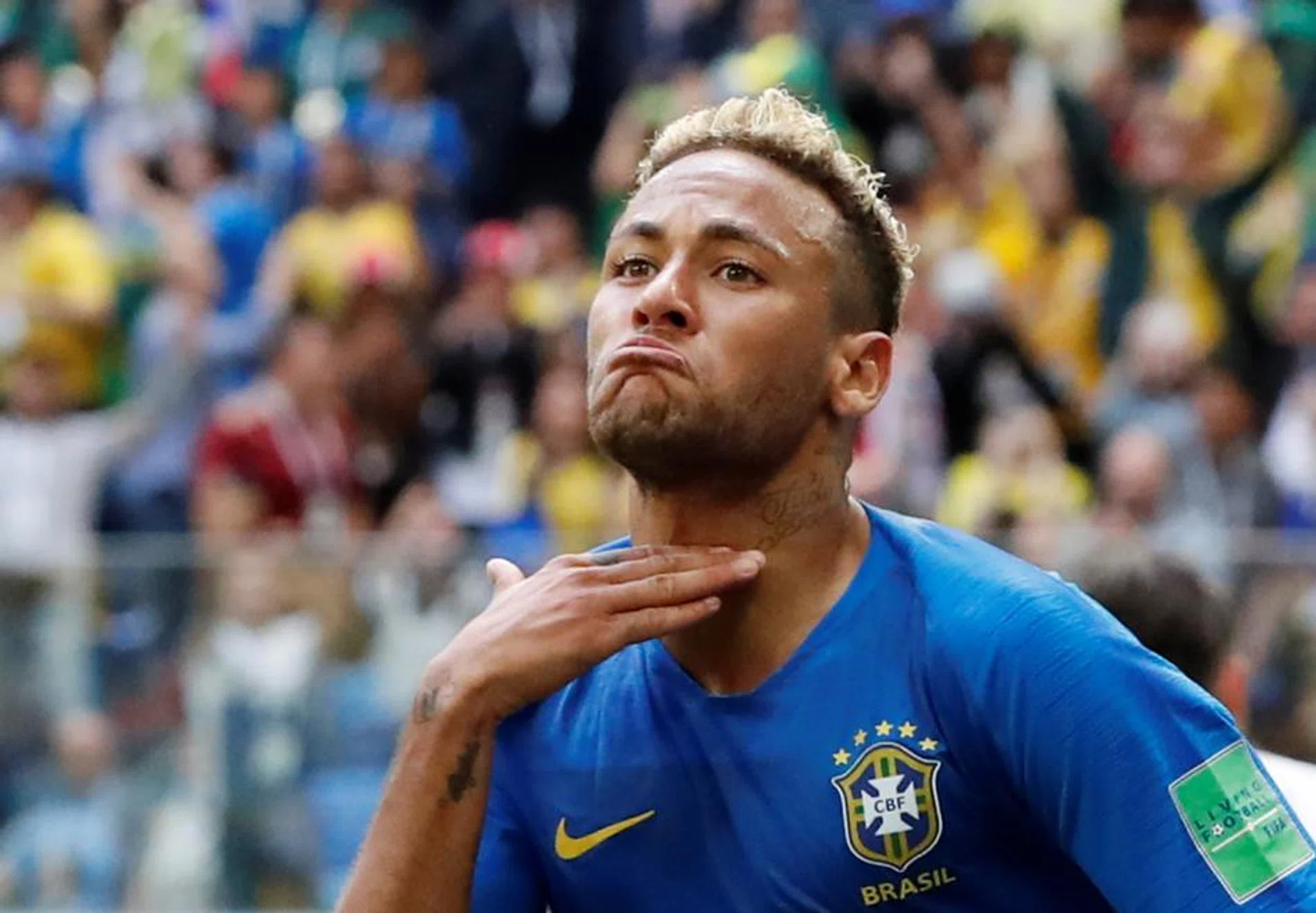 Neymar celebrates after scoring Brazil's second goal in injury-time.
