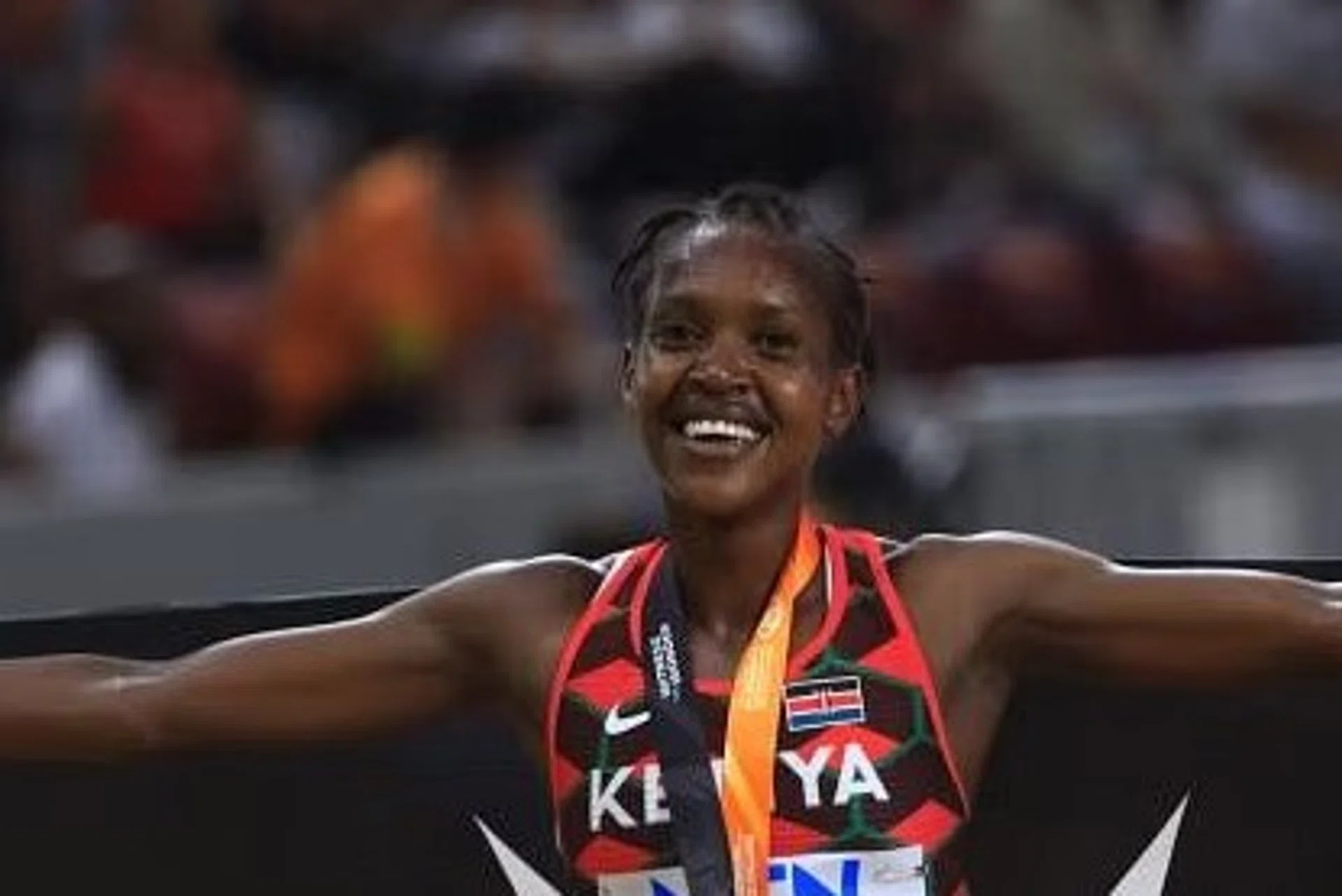 Kenya's Faith Kipyegon celebrates after winning the Women's 1500m final at the World Athletics Championships in Budapest on Aug 22, 2023. 