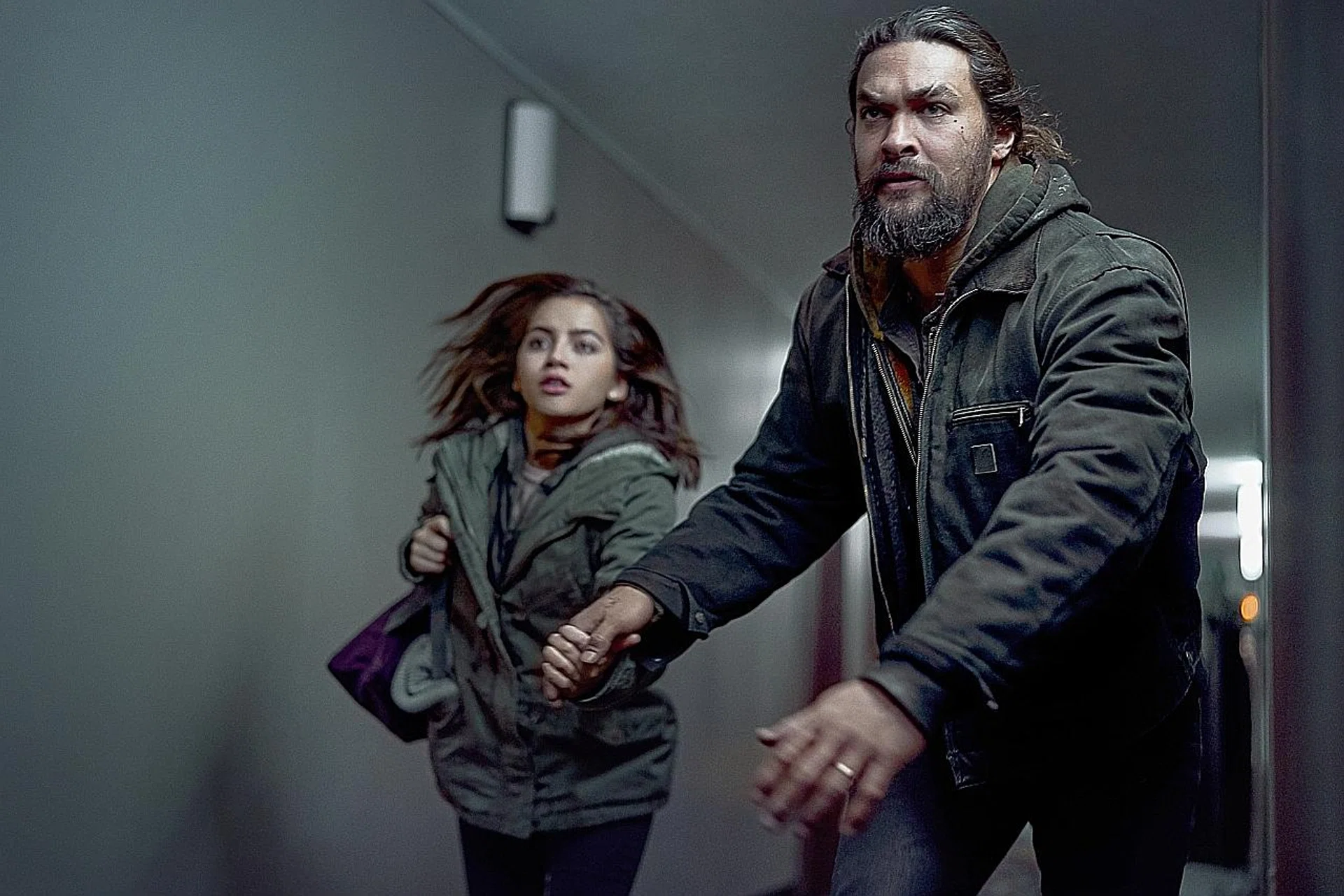 Isabela Merced and Jason Momoa play father and daughter in Sweet Girl, a film that sacrifices connection to the characters for silliness and daft action . 