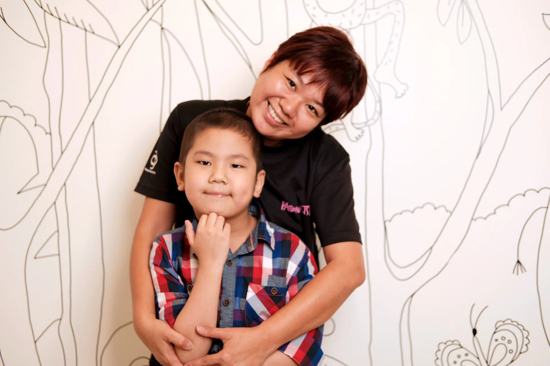 Madam Irene Lim and her seven-year-old son Terry, who battled Burkitt's lymphoma, can attest to how important the support from the Children's Cancer Foundation. 