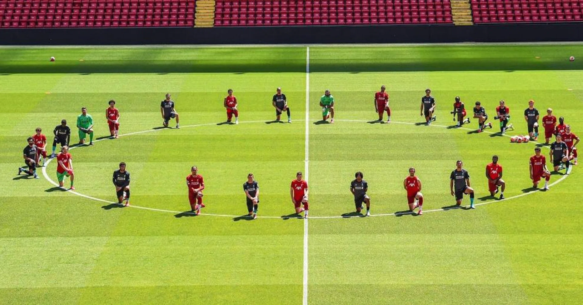 Liverpool's players "taking a knee" during a training session, sending out a powerful message against racism.