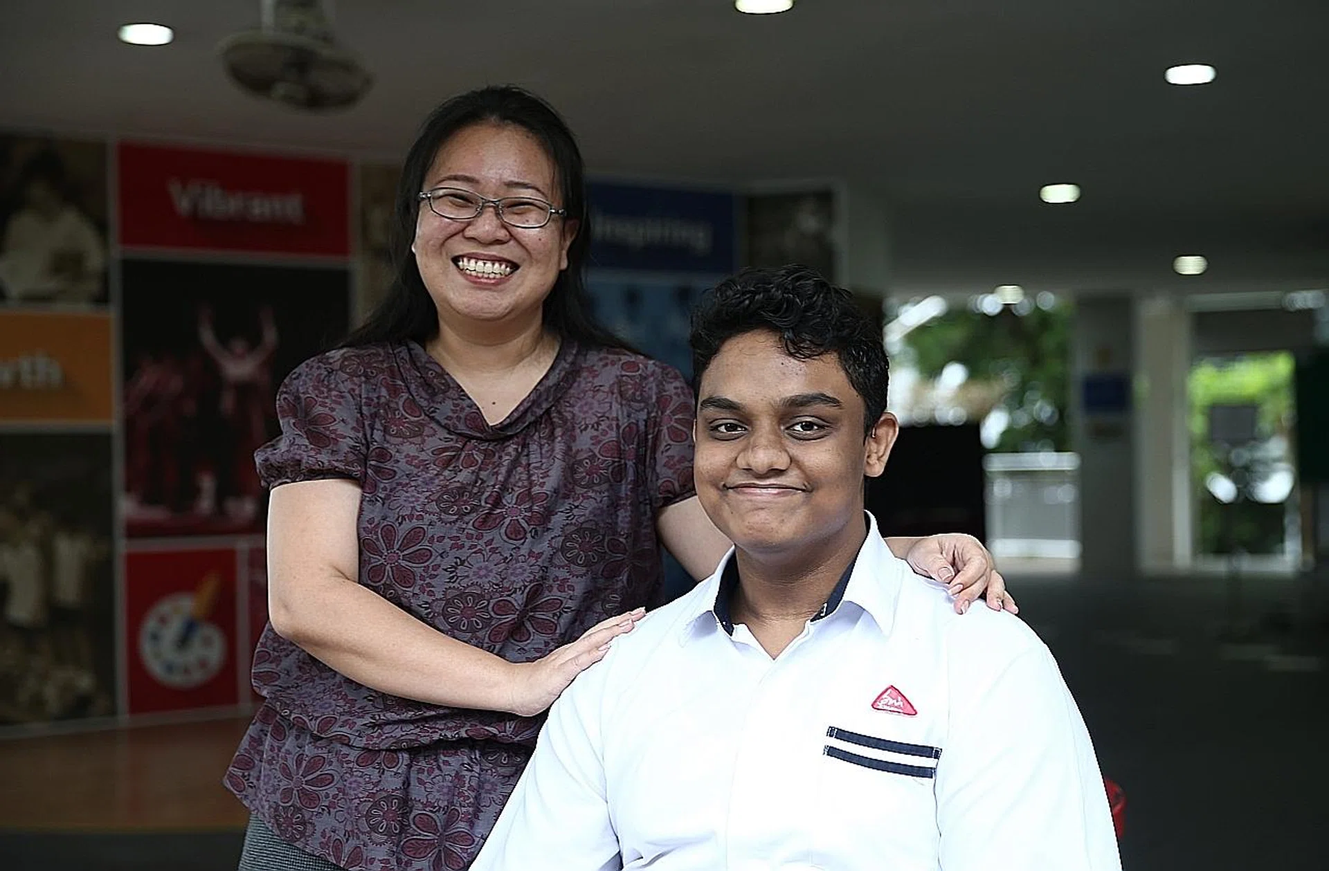 Muhammad Nihal Mohamed Abul Kassim with his teacher, Ms Faith Ng. 