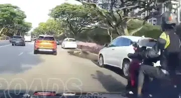 Reckless ECP overtake sends motorcycle crashing