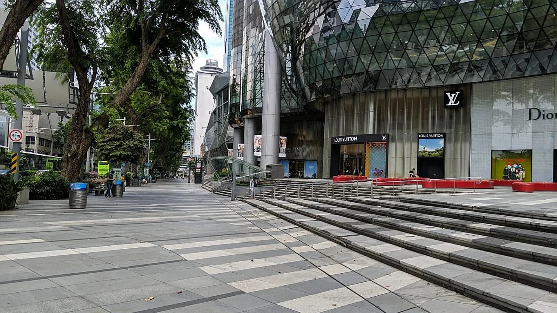 (Above) Orchard Road looking empty during lunchtime on a weekday.
