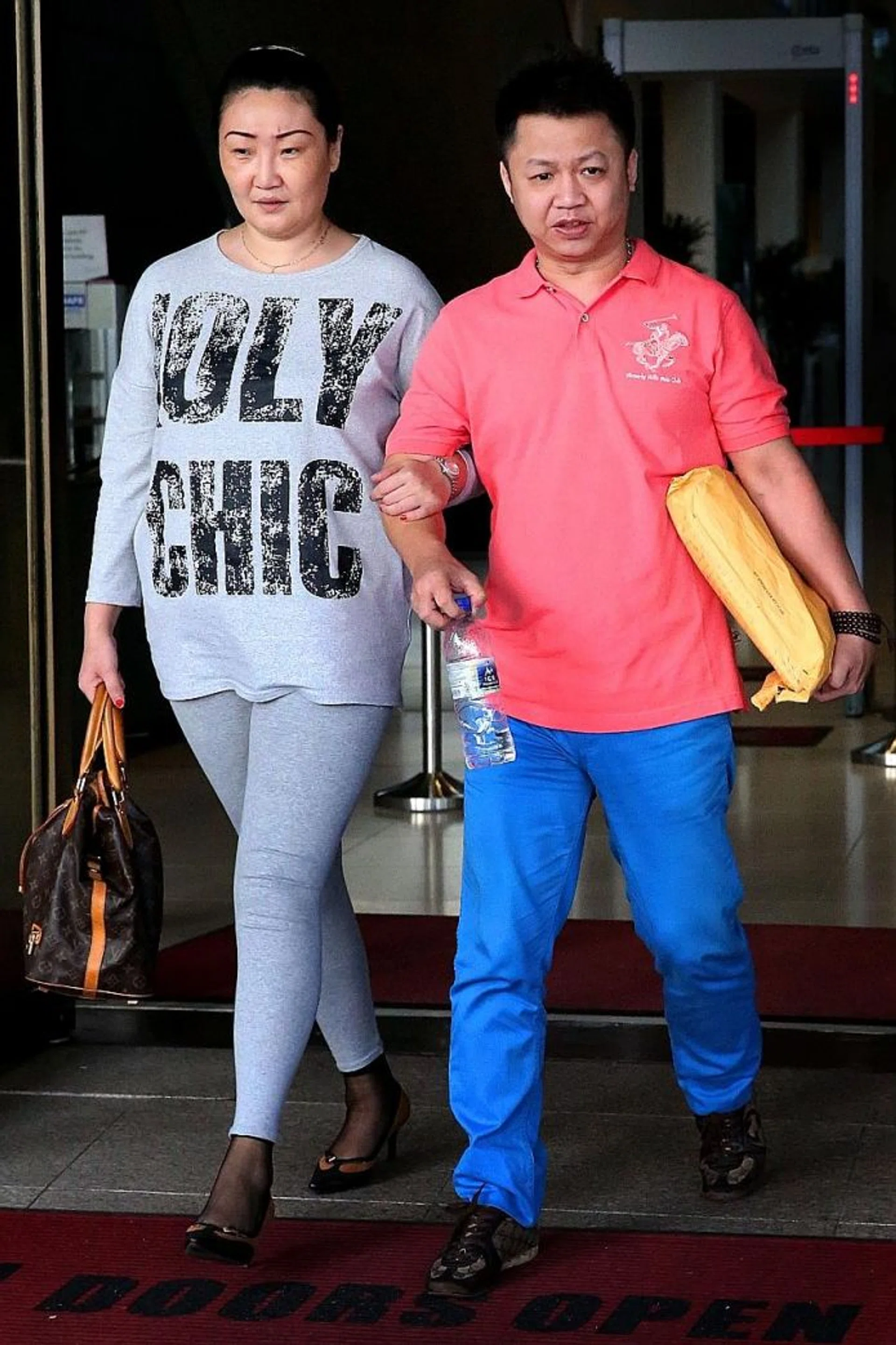 SENTENCED: Lee Seow Peng (above, right) had sex with the 12-year-old girl in the back seat of his car at Chinese Garden.