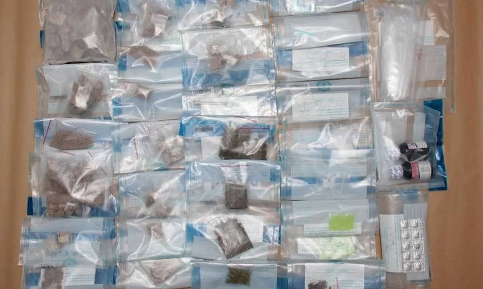 Drugs seized from a residential unit in Yishun Street 44 on March 5 included about 975g of heroin and more.