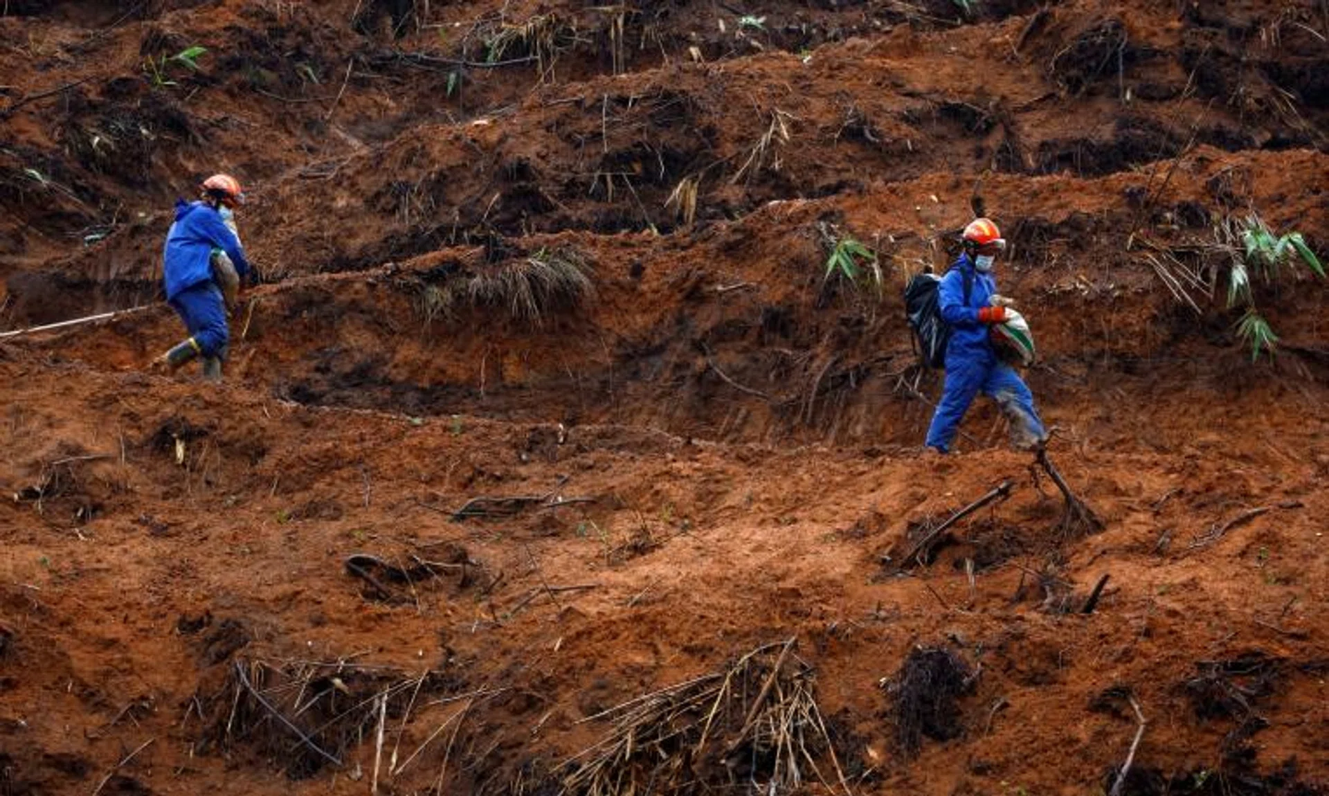 Rescue workers at the crash site in Wuzhou in the Guangxi Zhuang Autonomous Region on March 24, 2022 