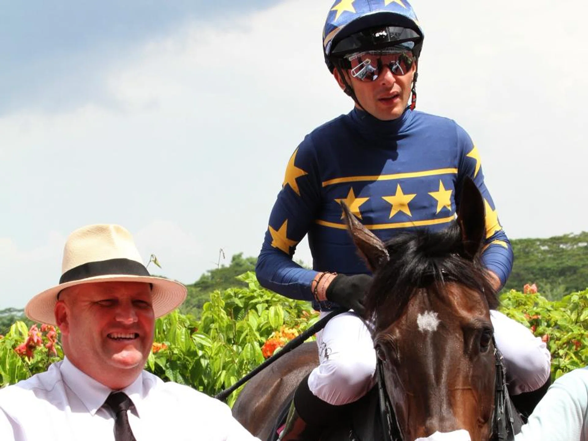 Trainer Daniel Meagher leading in Lim's Shavano (Marc Lerner) after his second Kranji win on Sept 28.
