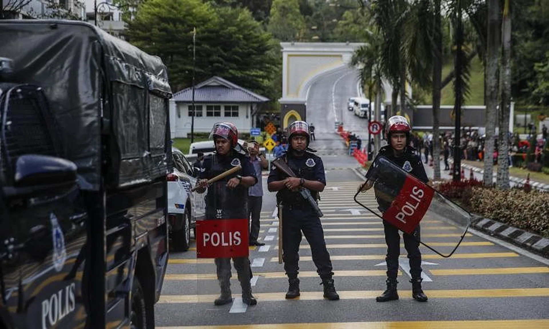 Unit officers from Royal Malaysia Police guard the entrance of National Palace in Kuala Lumpur on Nov 22, 2022.
