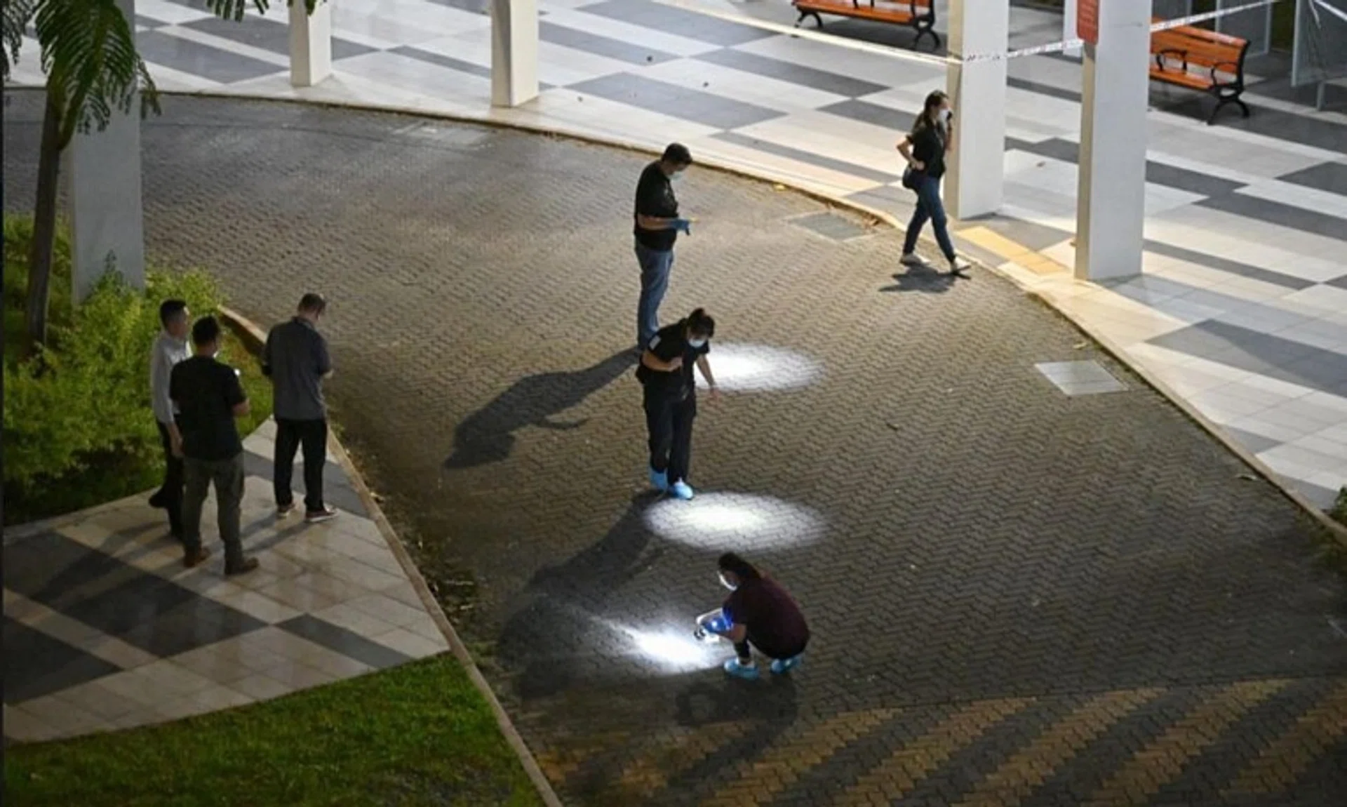 Police at the scene where a fatal stabbing took place near 311B Clementi Avenue 4 on Oct 21. 