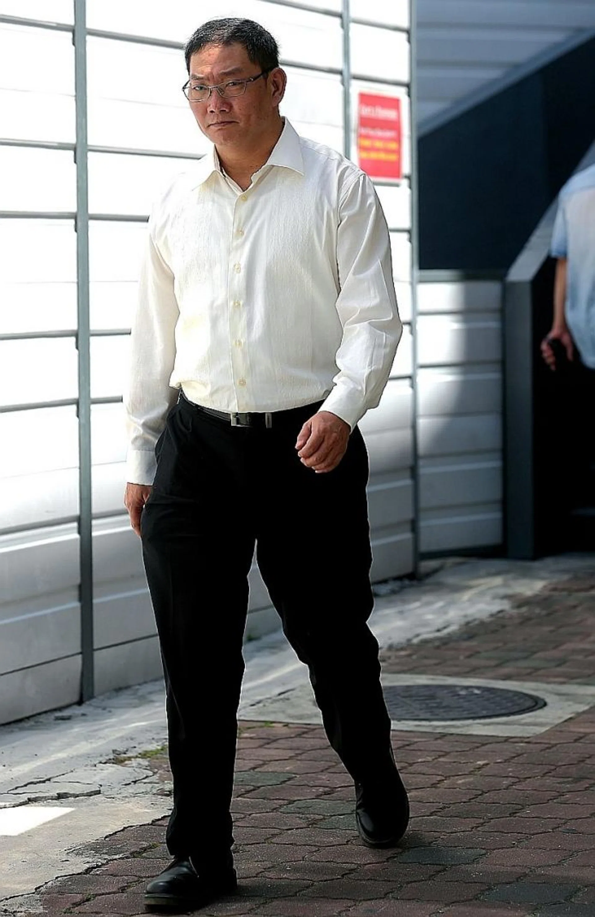 IN COURT: Cabby Chan Chuan Heng (above) is charged with voluntarily causing hurt to Mr Arne Corneliussen.