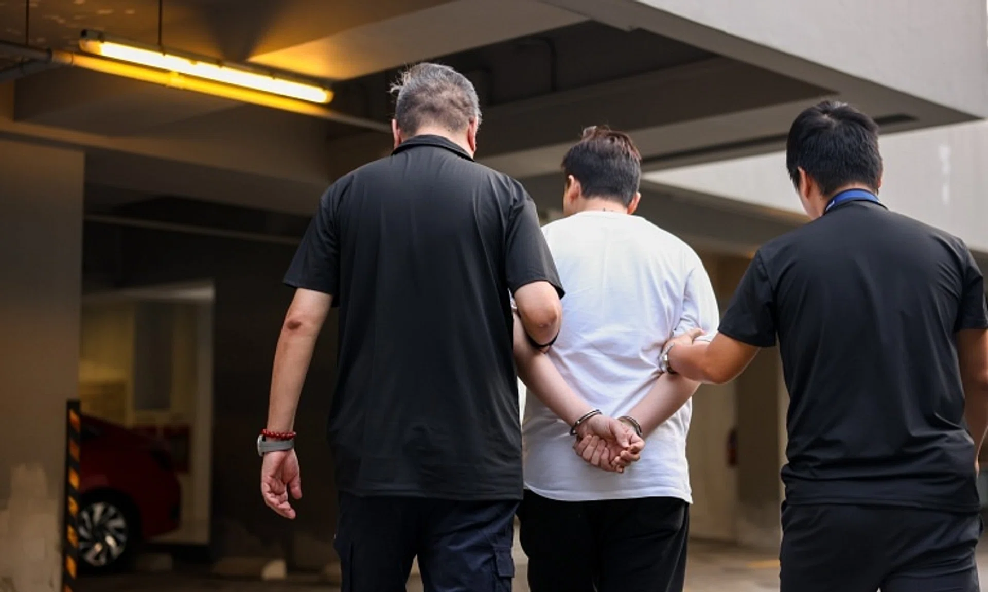 MOM officers arrested a 33-year-old man suspected to be part of a syndicate that operated 28 shell public entertainment outlets that hired work permit holders as performers.