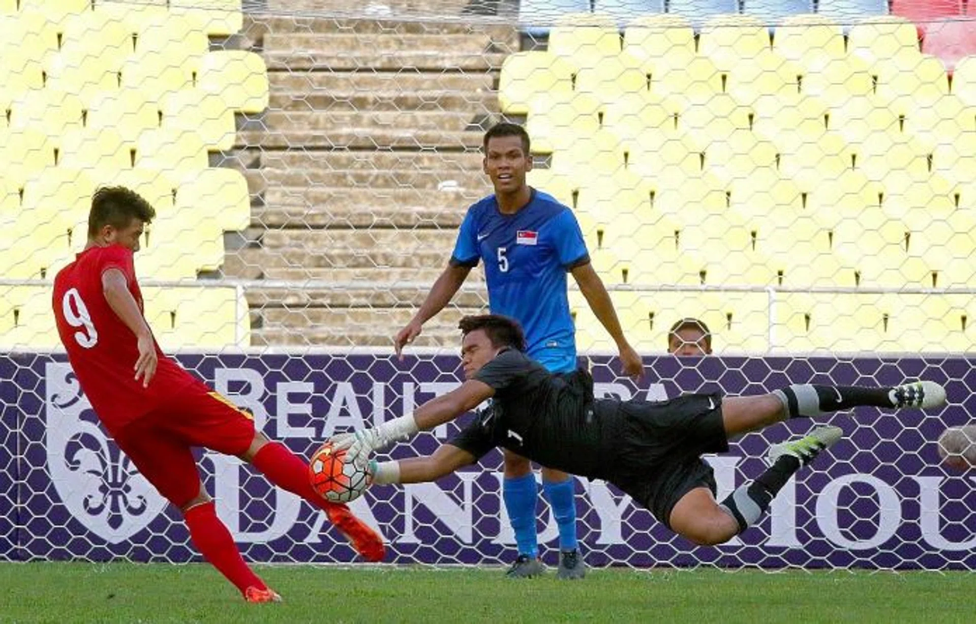 SORRY LIONS: Singapore Under-21s (in blue) finished the four-team tournament in last place.