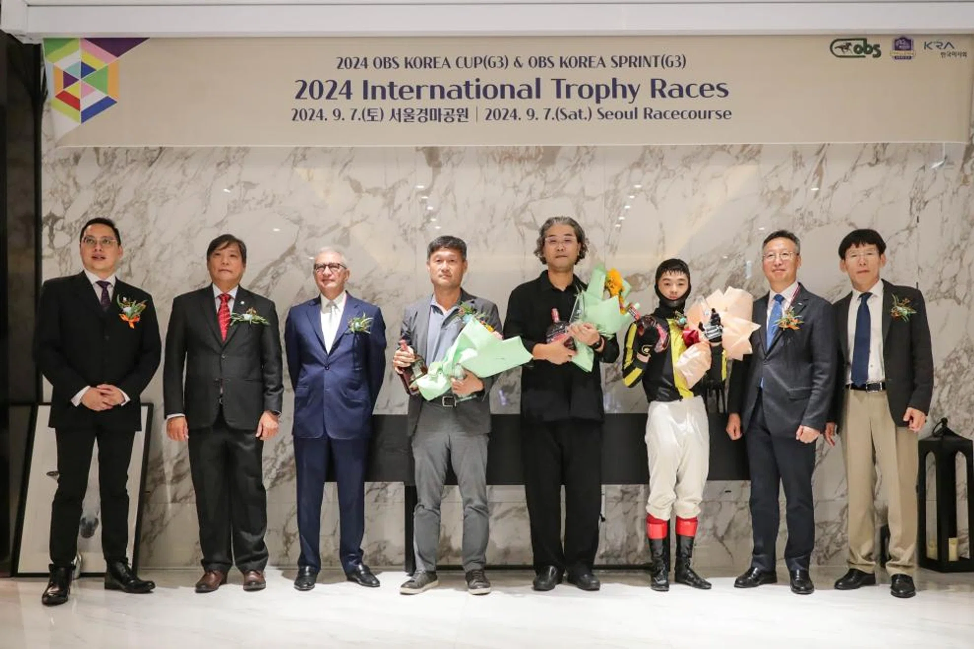Singapore Pools representatives (from left) senior manager Eric Loh, chief product officer Simon Leong and chairman Kai S. Nargolwala celebrating Dokkaebe's win in the Singapore Pools Trophy with winning trainer Cho Hyun-soo, owner Lee Bong-hyun, jockey Kim Seong-hyun and KRA's executive director Song Dae-young and general manager Yoo Byeong-don on Sept 7.