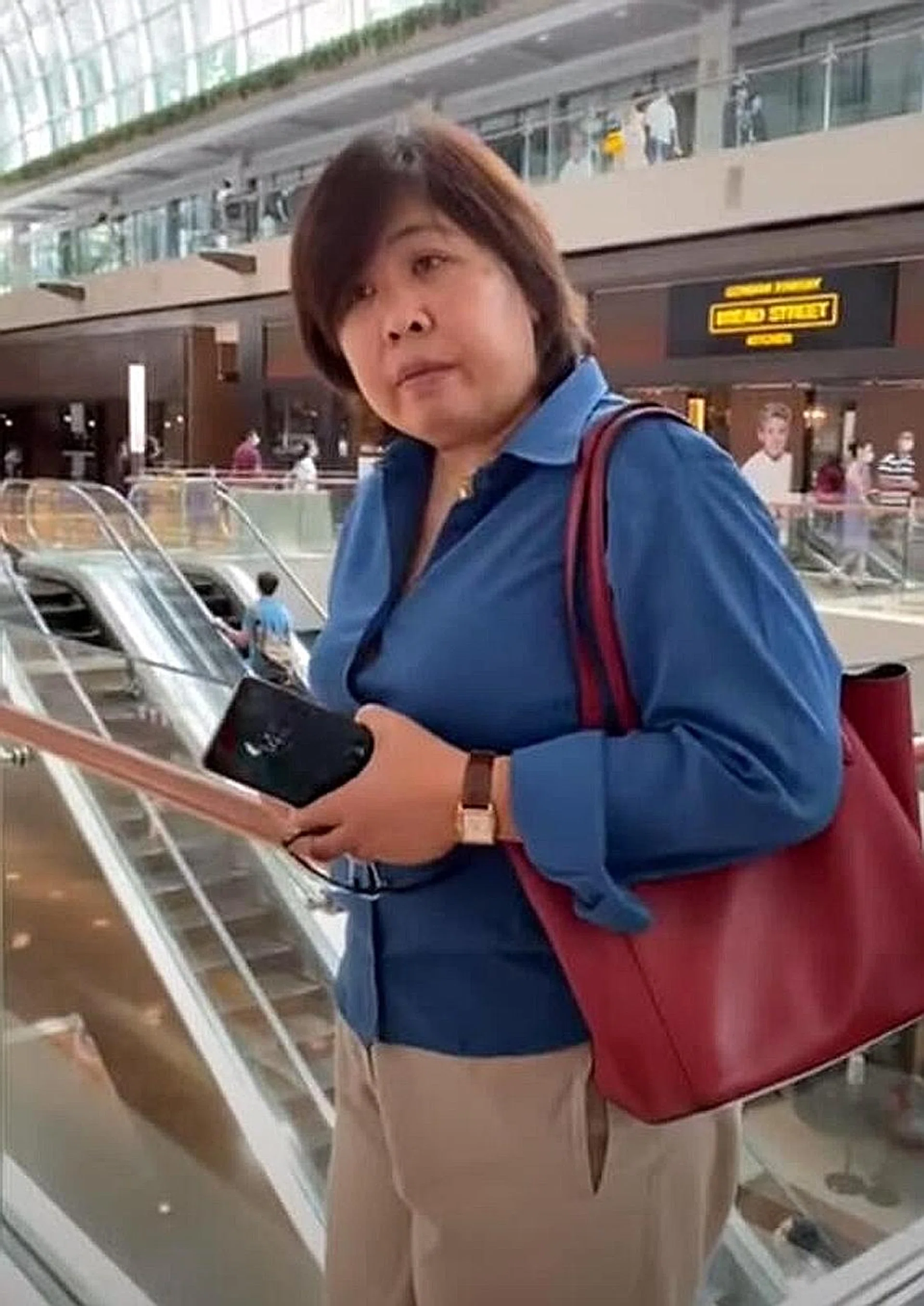 Screengrab of widely circulated video showing Phoon Chiu Yoke not wearing a mask at Marina Bay Sands on May 15.