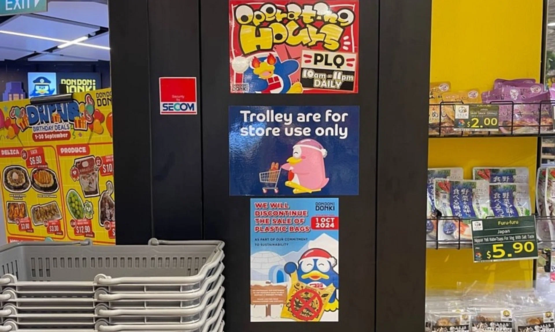 A sign outside Don Don Donki's Paya Lebar Quarter Mall outlet says it will discontinue the sale of plastic bags from Oct 1.