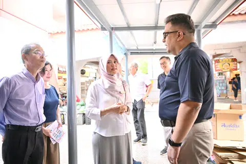 Incumbent Jurong GRC MP Rahayu Mahzam speaking to RDU secretary-general Ravi Philemon at Bukit Batok East Point on March 15.