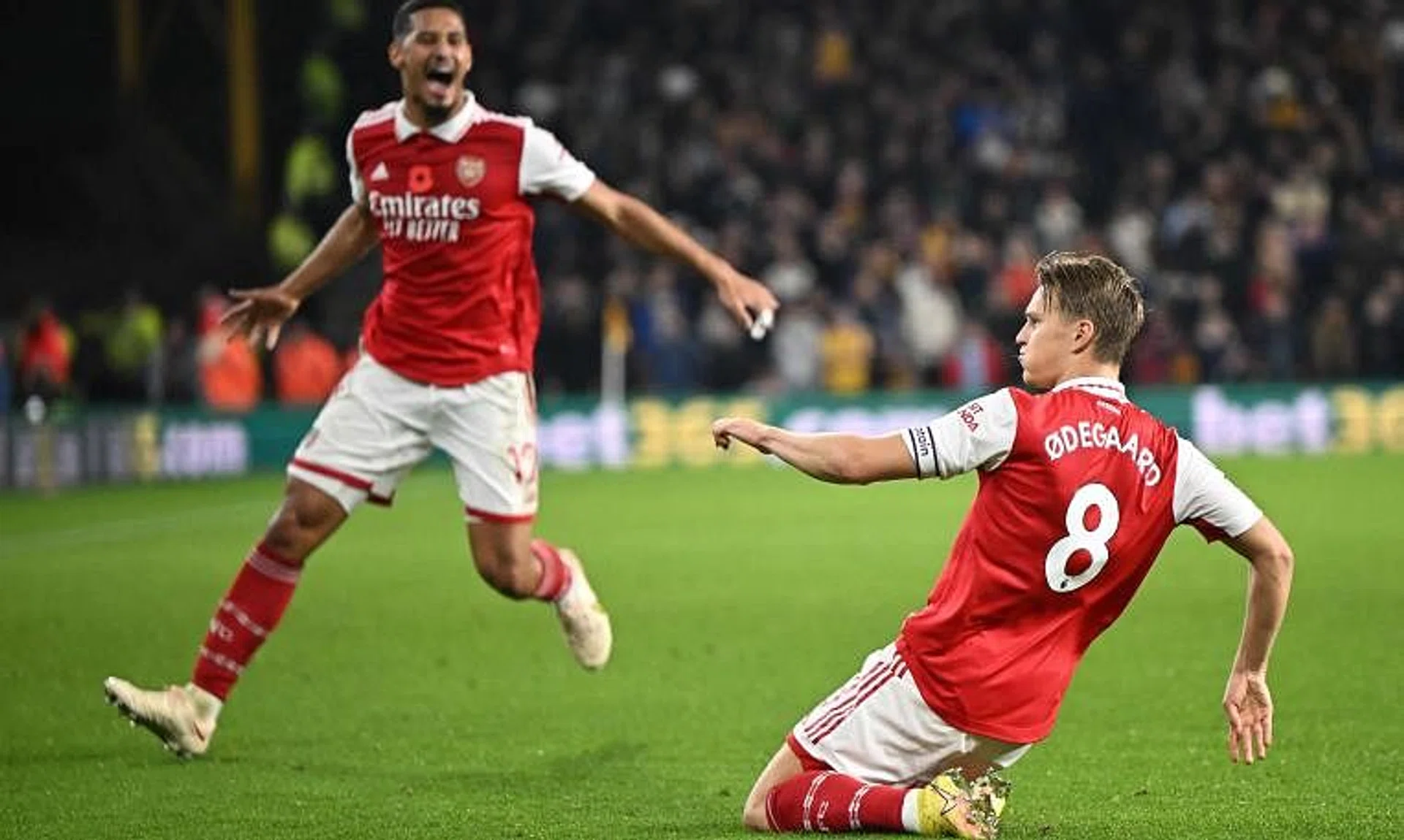 Arsenal's Martin Odegaard celebrates scoring his team's second goal during the 2-0 Premier League win at Wolverhampton Wanderers on Nov 12, 2022.