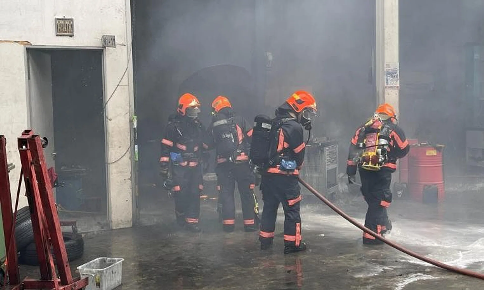 The fire involved the contents of a car in a workshop on the first floor.