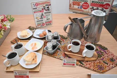 A mock-up showing promotion deals offered by Chang Cheng Mee Wah at the launch of the SG60 deals at coffee shops across the island.