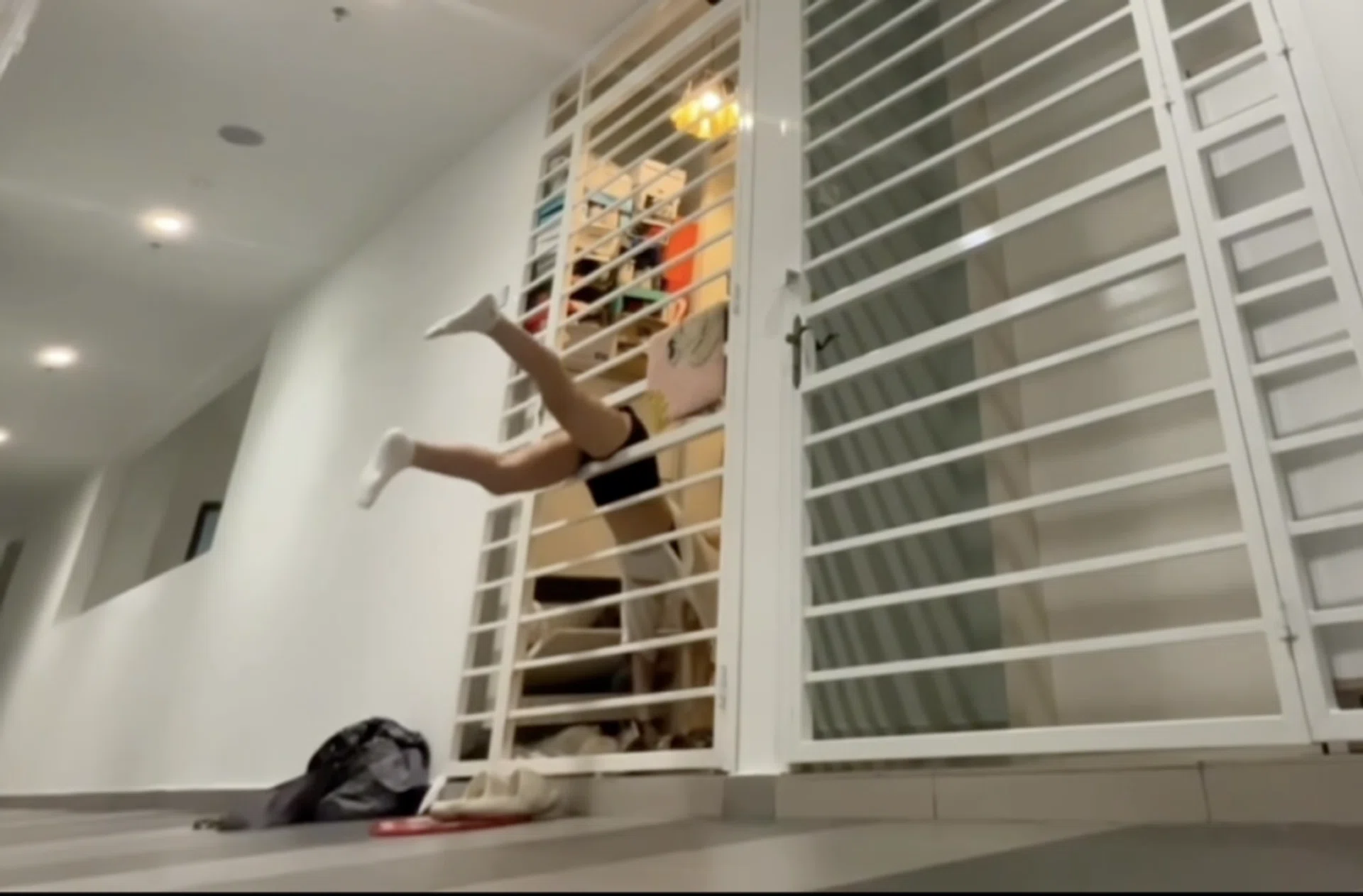 It's impressive how she managed to squeeze through the gap.