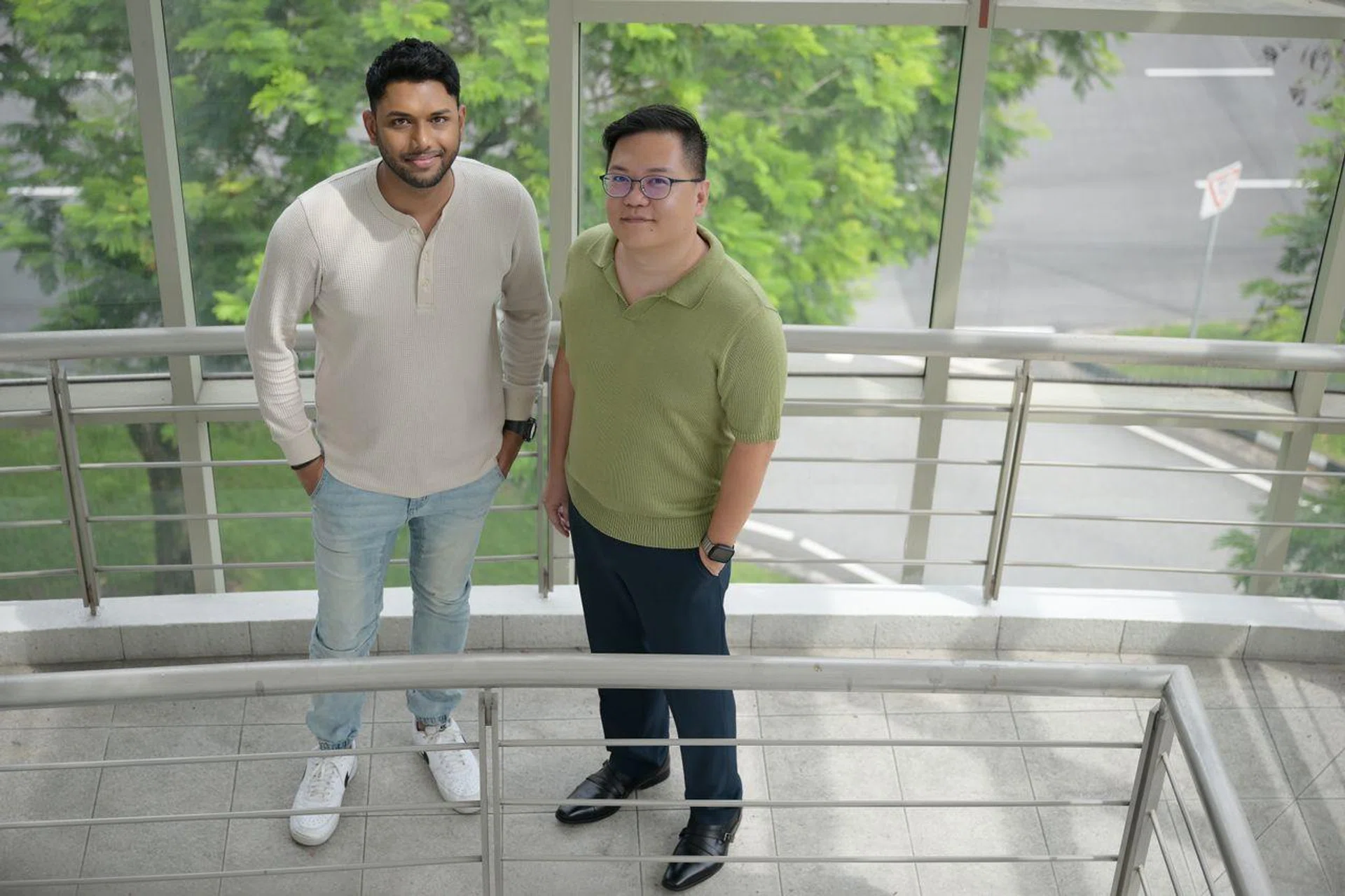 Former DJ Kyrul Ashrie Hans Daud (left) and Richard, a representative from the Singapore Anti-Narcotics Association, work together to advocate against the abuse of drugs.