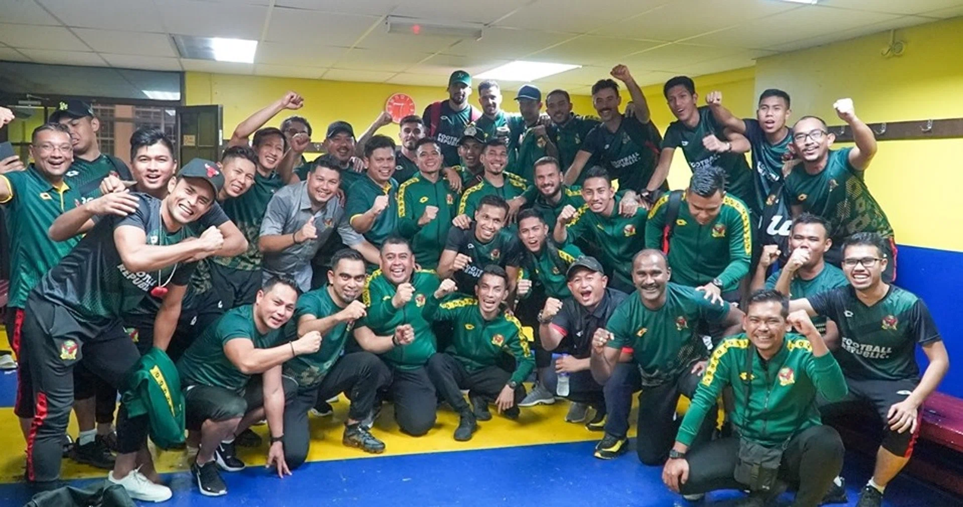 Kedah's players and staff celebrating after booking their place in the Malaysia Cup final.