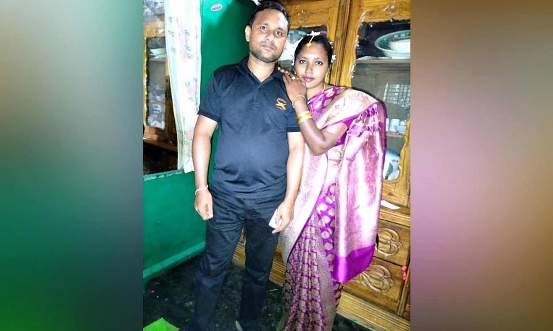 Mr Salim Hossain, who died in a workplace accident in Lentor Avenue on Sept 17, with his wife.