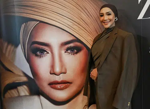 Malaysian pop diva Ziana Zain sings on two songs on Singapore rapper Alyph's new album, The Storm.