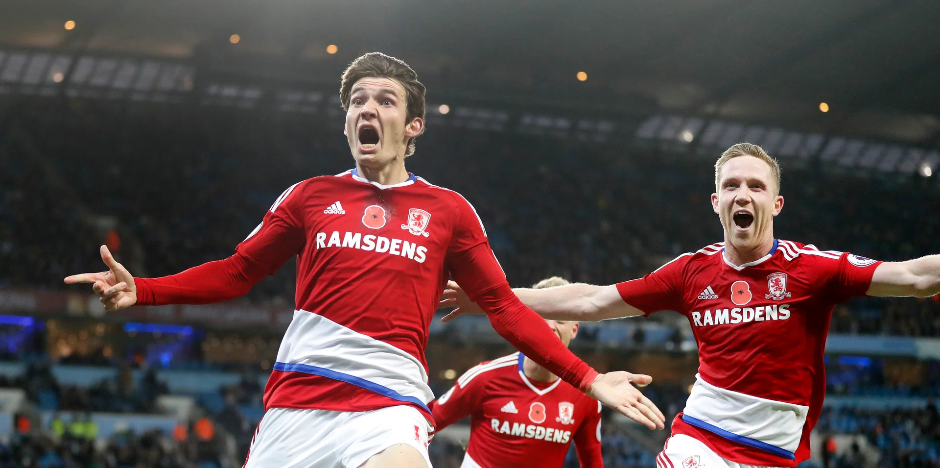 DRAMATIC EQUALISER: Marten de Roon's (left) late header gives Middlesbrough a point against Manchester City.