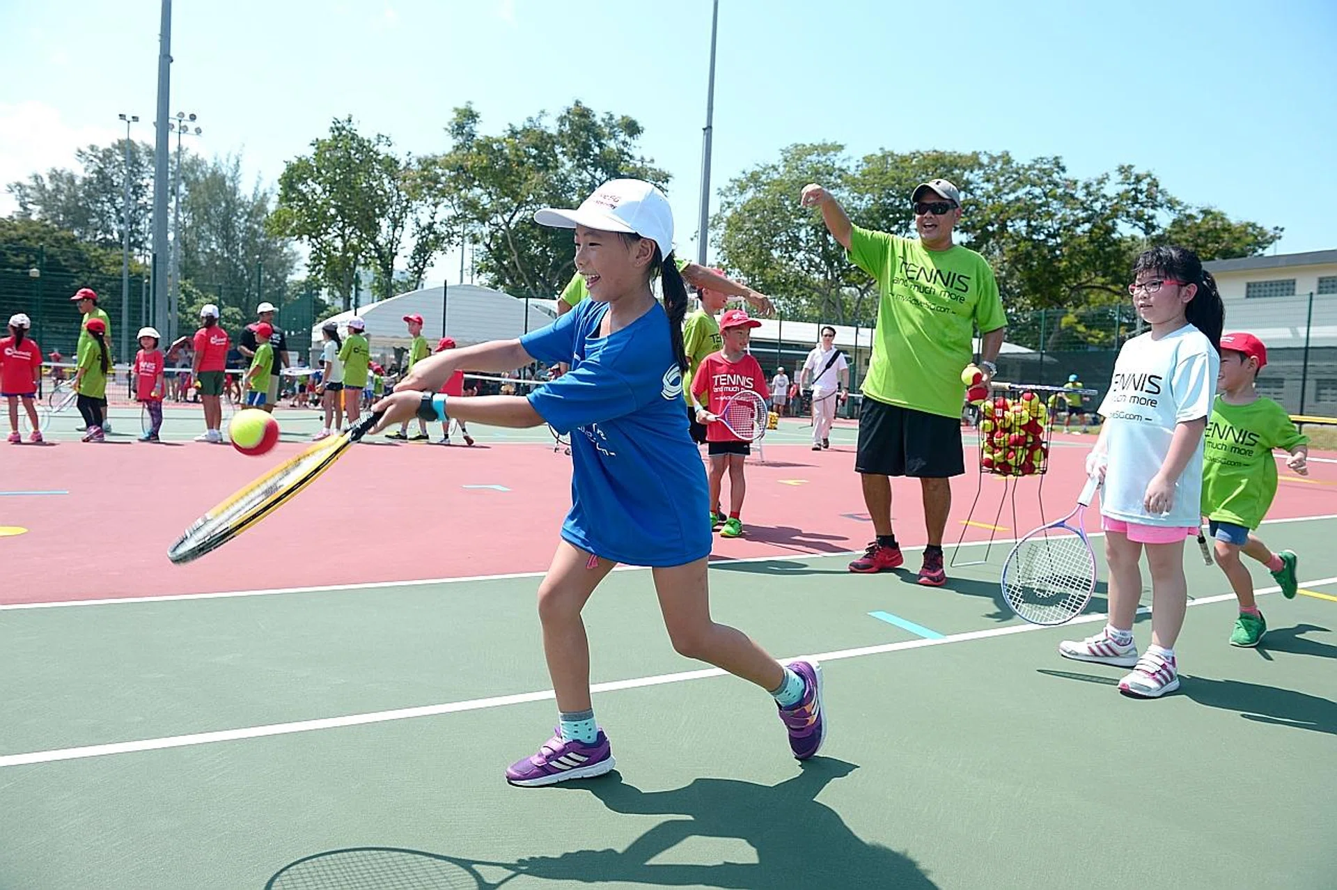 Eight-year-old Koh Wensyn learning to play mini tennis at the launch of the ActiveSG tennis academy in Kallang last year.