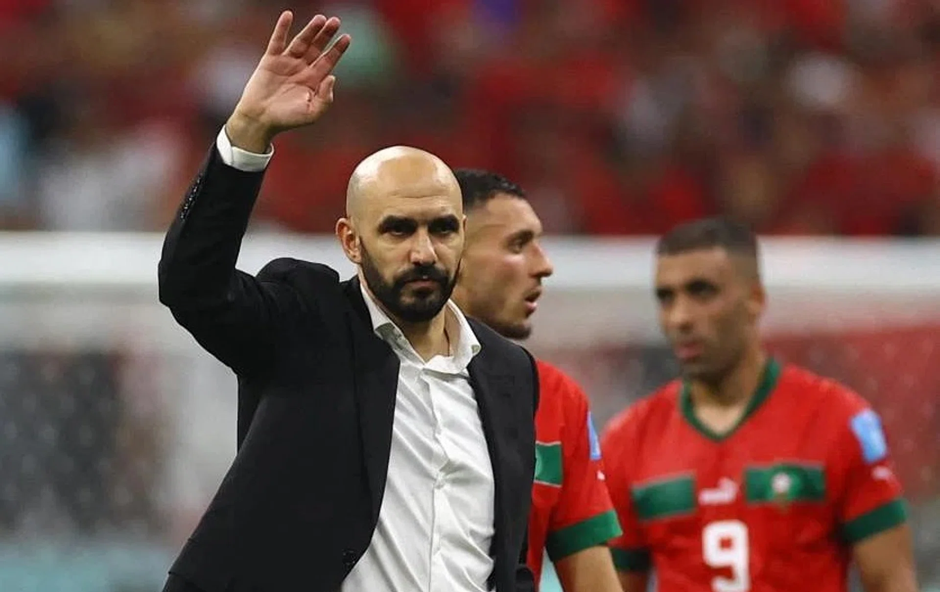 Coach Walid Regragui acknowledges the fans after the semi-final match as Morocco are eliminated from the World Cup on Wednesday.