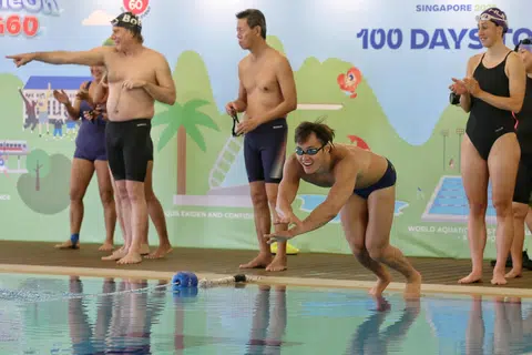 National swimmer Teong Tzen Wei (diving into the pool) said there is no need to feel pressure as he prepares for the World Aquatics Championships in July.