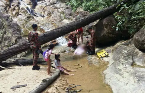 Singapore man dies trying to save daughter at Johor waterfall