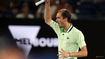 Medvedev battles back to down Auger-Aliassime in Aus Open thriller