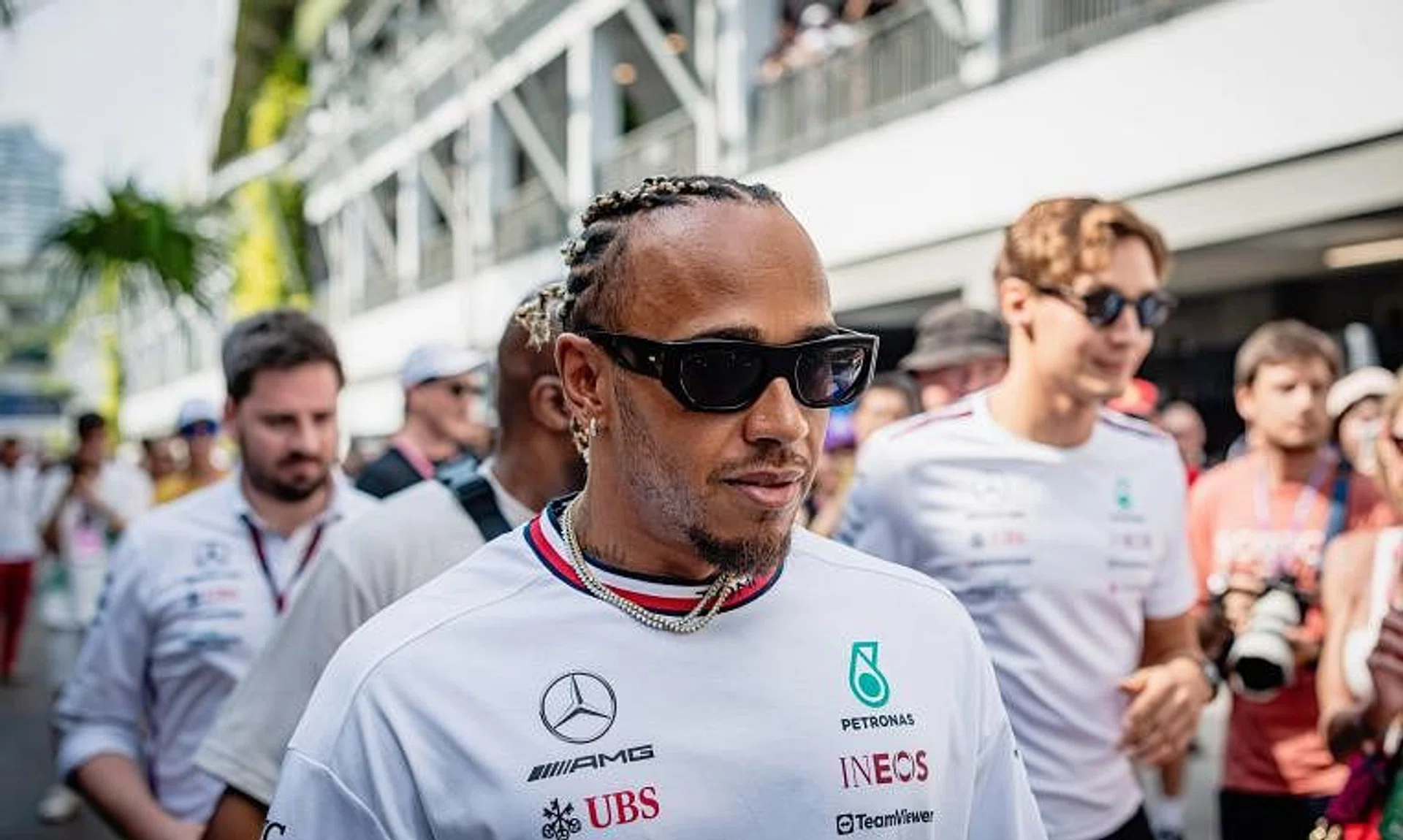 Mercedes' Lewis Hamilton walks in the paddock ahead of a practice session for the Singapore Grand Prix in 2023.